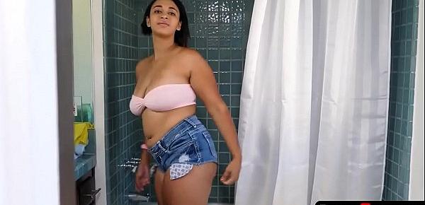  Black stepsister with big natural tits is about to step into the shower when she feels someone watching her